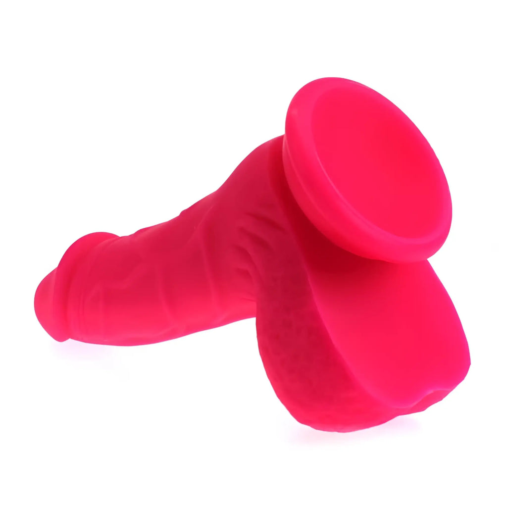 Bright pink silicone x-men pedro thick realistic cock with balls featuring a rounded head and textured shaft