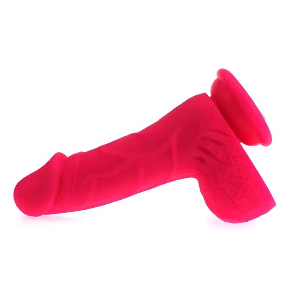 Vibrant pink silicone dildo with textured surface and rounded head from X-MEN Pedro Thick Realistic Cock w Balls Pink