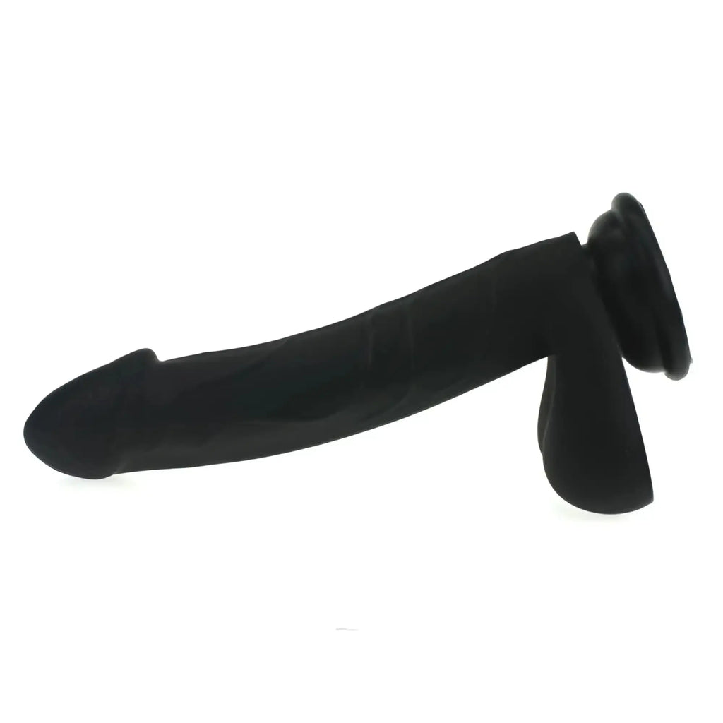 Black silicone anal plug with flared base and textured surface from x-men realistic cock with balls black product