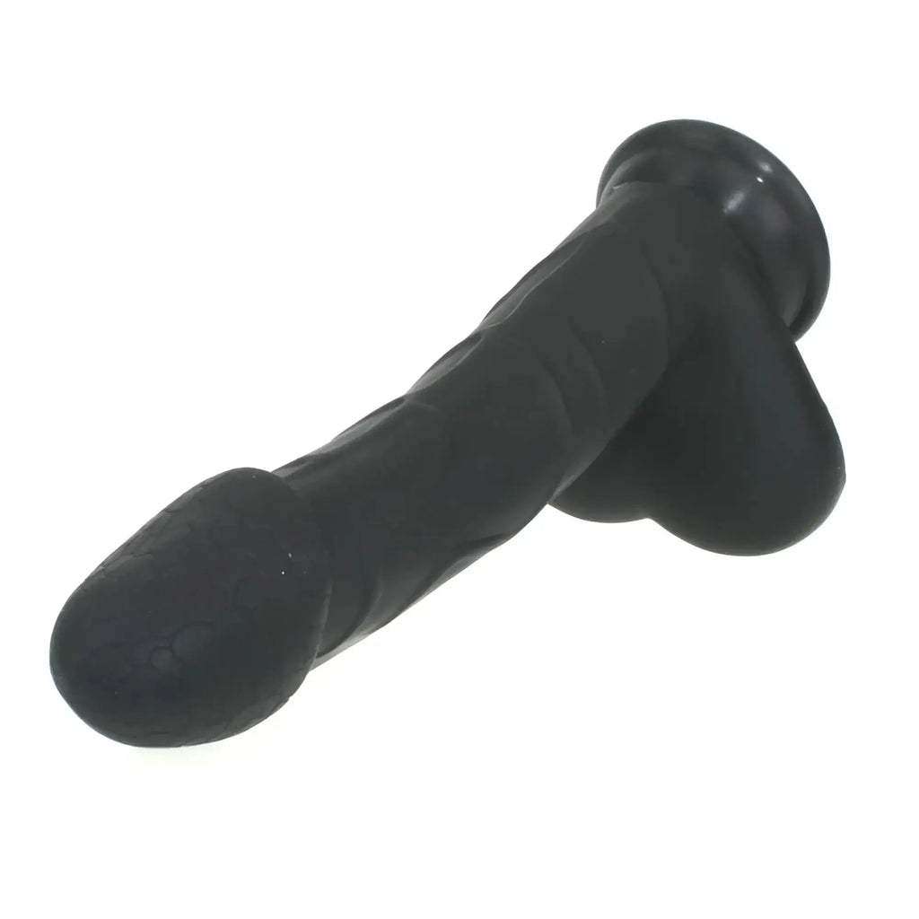 Black silicone dildo with textured surface and rounded head from X-MEN realistic cock w balls black product line
