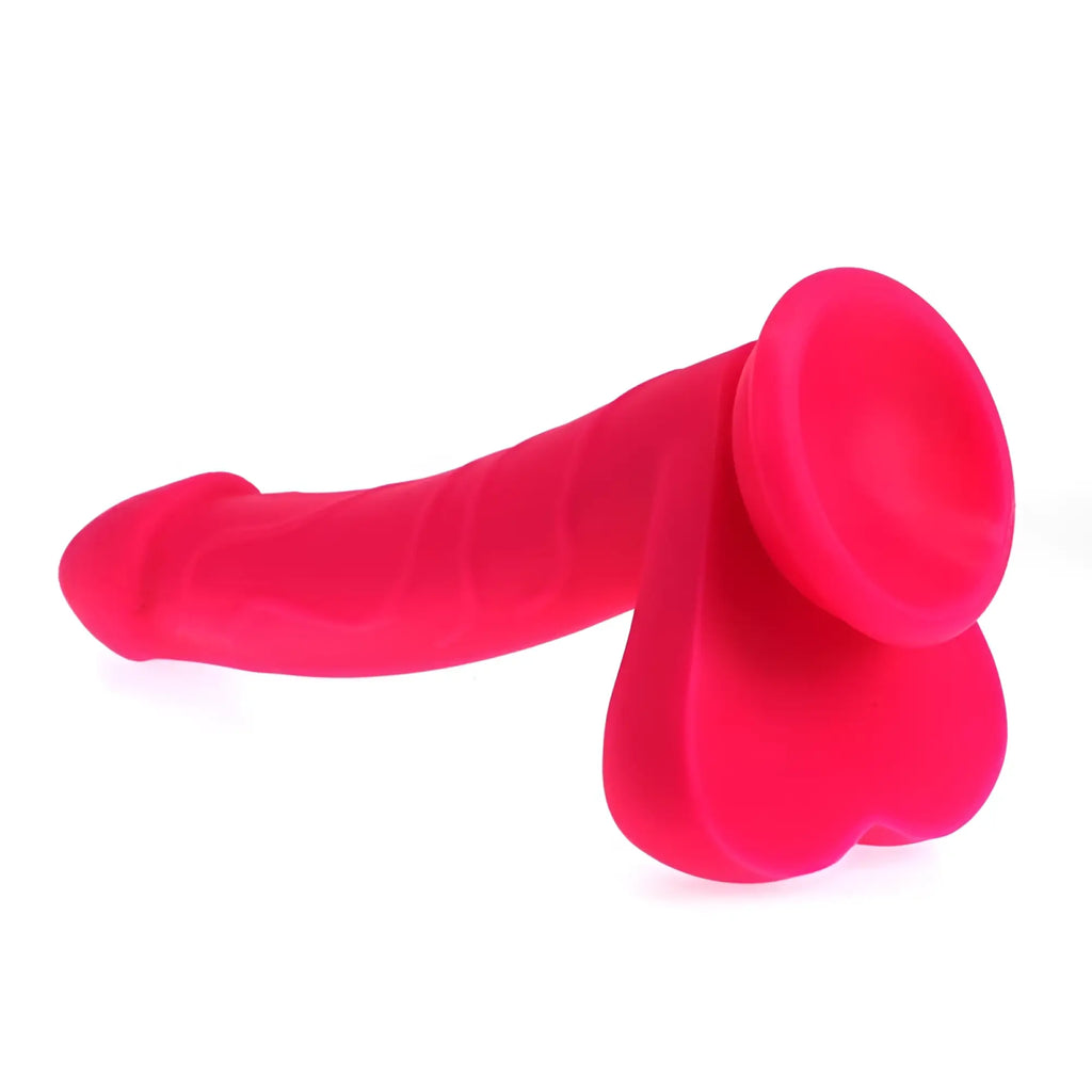 Bright pink silicone suction cup dildo with heart-shaped base from X-MEN realistic cock w balls pink collection