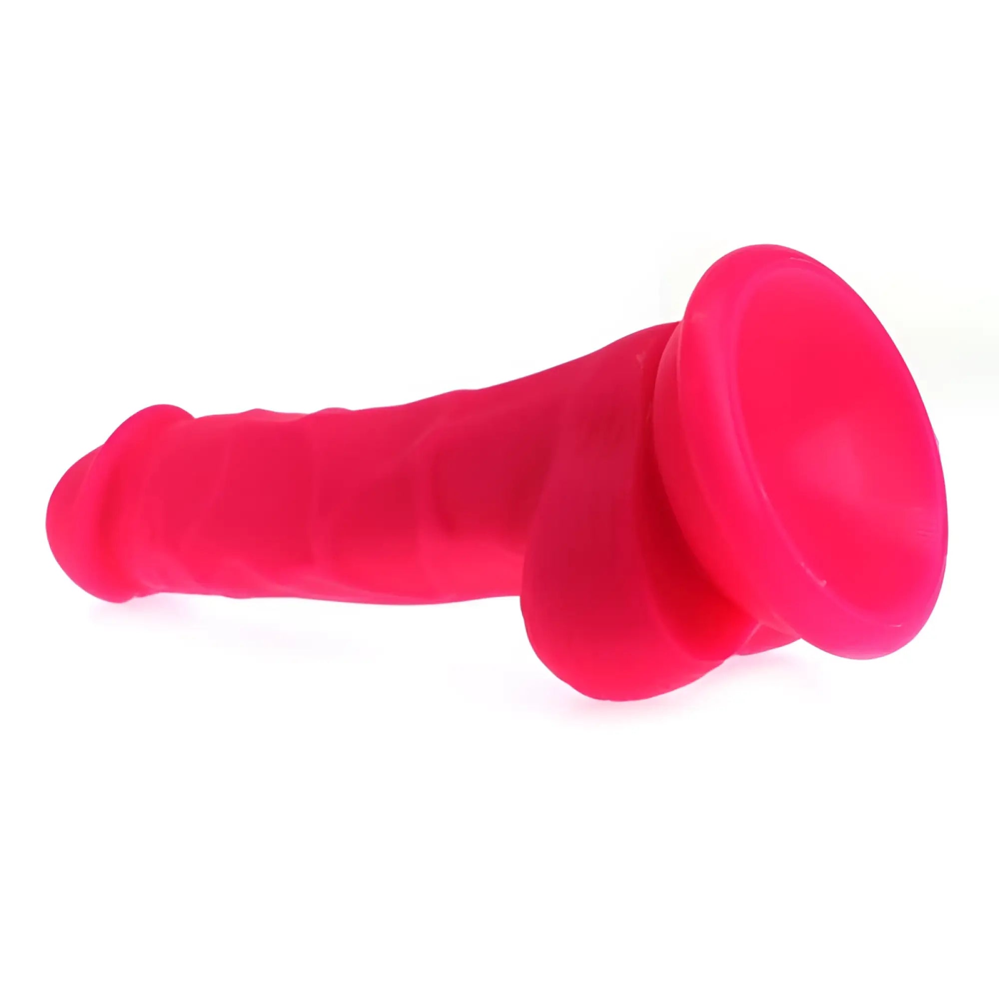 Bright pink silicone X-MEN realistic dildo with veined textured ridges and balls designed for suction cup use