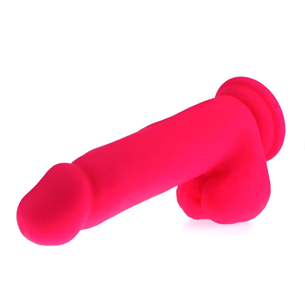 Bright pink silicone x-men thick realistic cock with rounded head and textured base for adult use