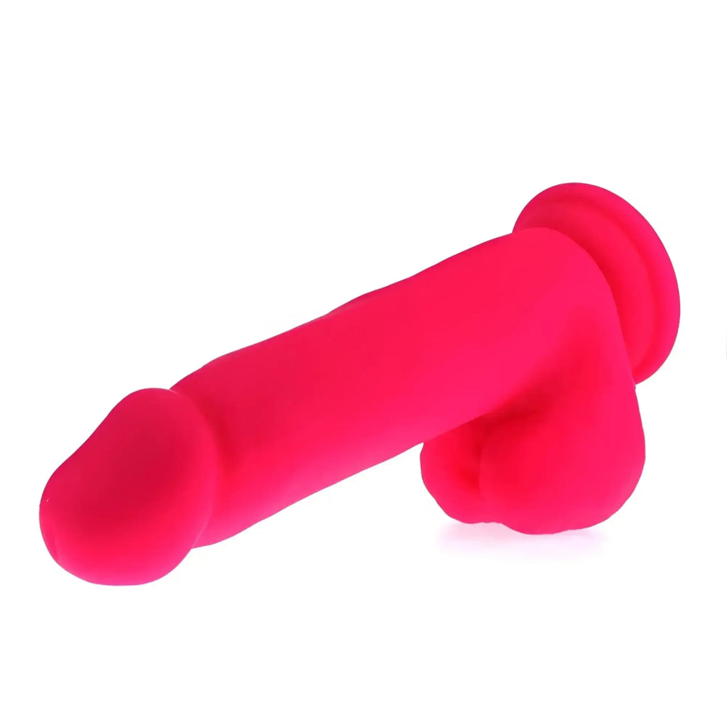 Bright pink silicone x-men thick realistic cock with rounded head and textured base for adult use
