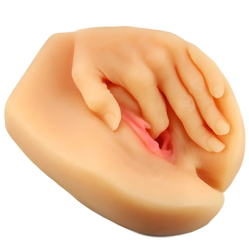 Beige silicone hand-shaped adult toy with pink internal detail from X5 Men Spread Me collection