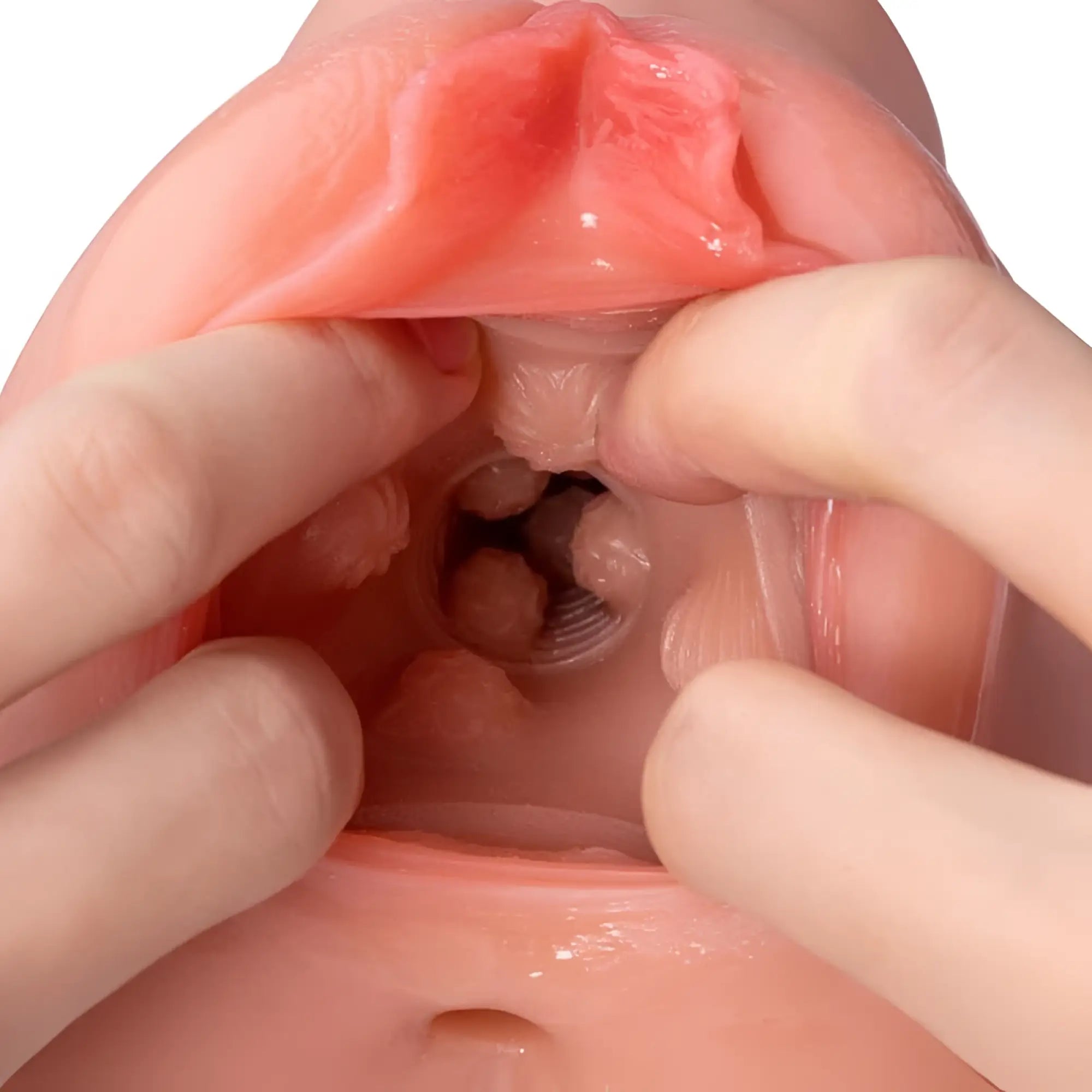 Pink silicone anal plug with textured surface and internal ridges from XISE Ramar realistic vibrating anal vaginal masturbator
