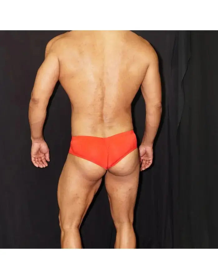 Red boxer underwear by Arroyman featuring a snug fit and smooth fabric shown on a model from the back.