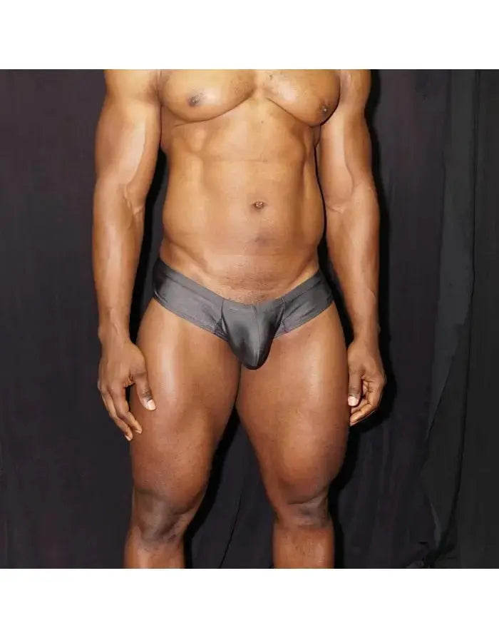 Black men's boxer underwear by Arroyman featuring a sleek design and soft material shown on a model.