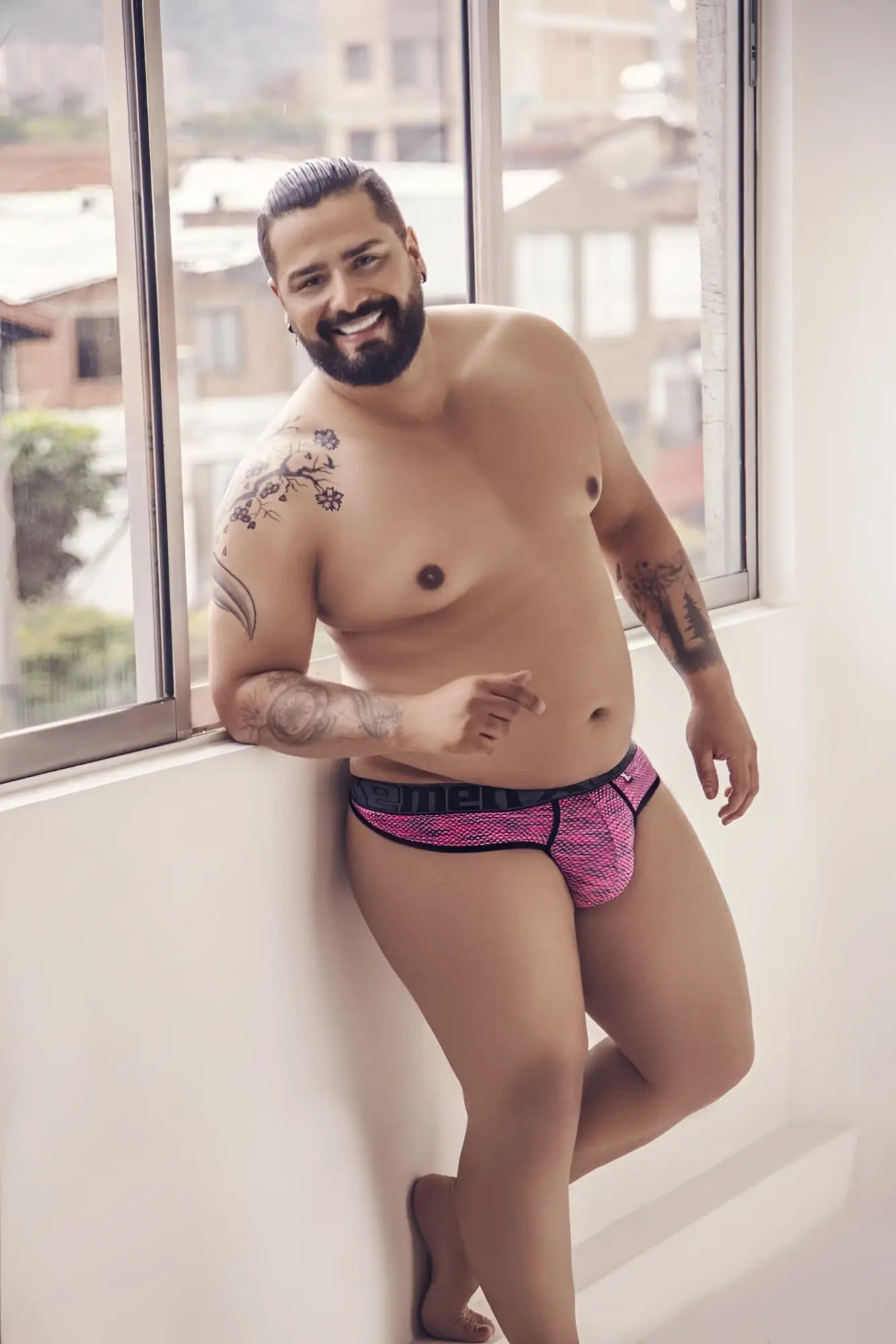Pink patterned microfiber mesh briefs with black trim from xtremen 91100x micro thong collection