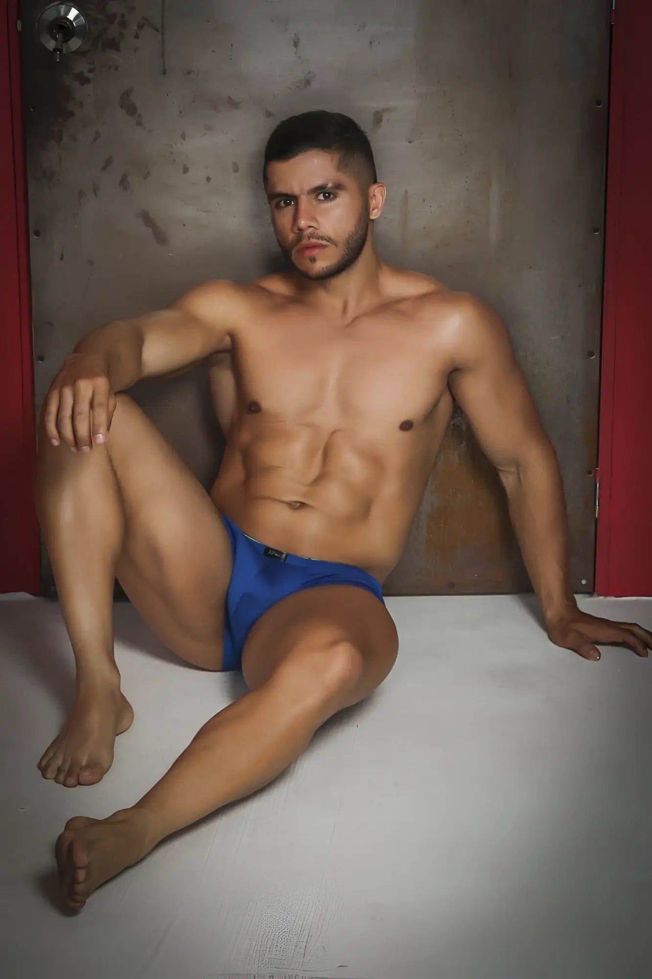 Xtremen 91192 jacquard bikini athletic briefs in royal blue with a subtle green logo on the waistband