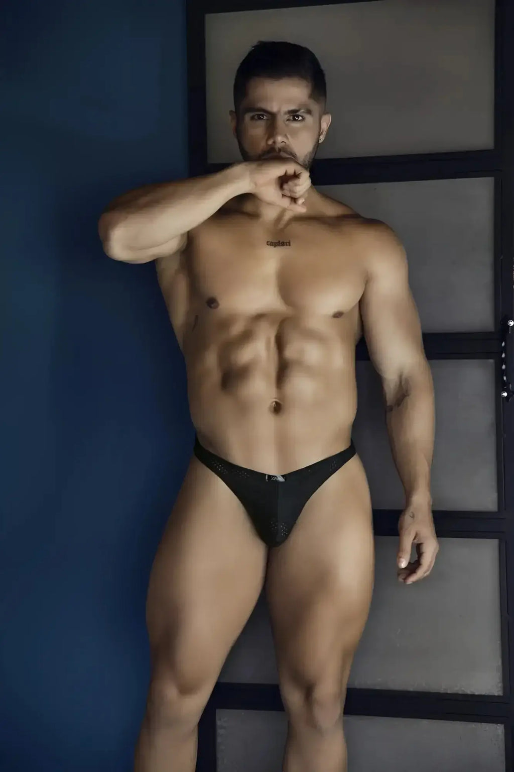 Xtremen 91214B black microfiber thongs with black lace trim, subtle pattern, and small front logo