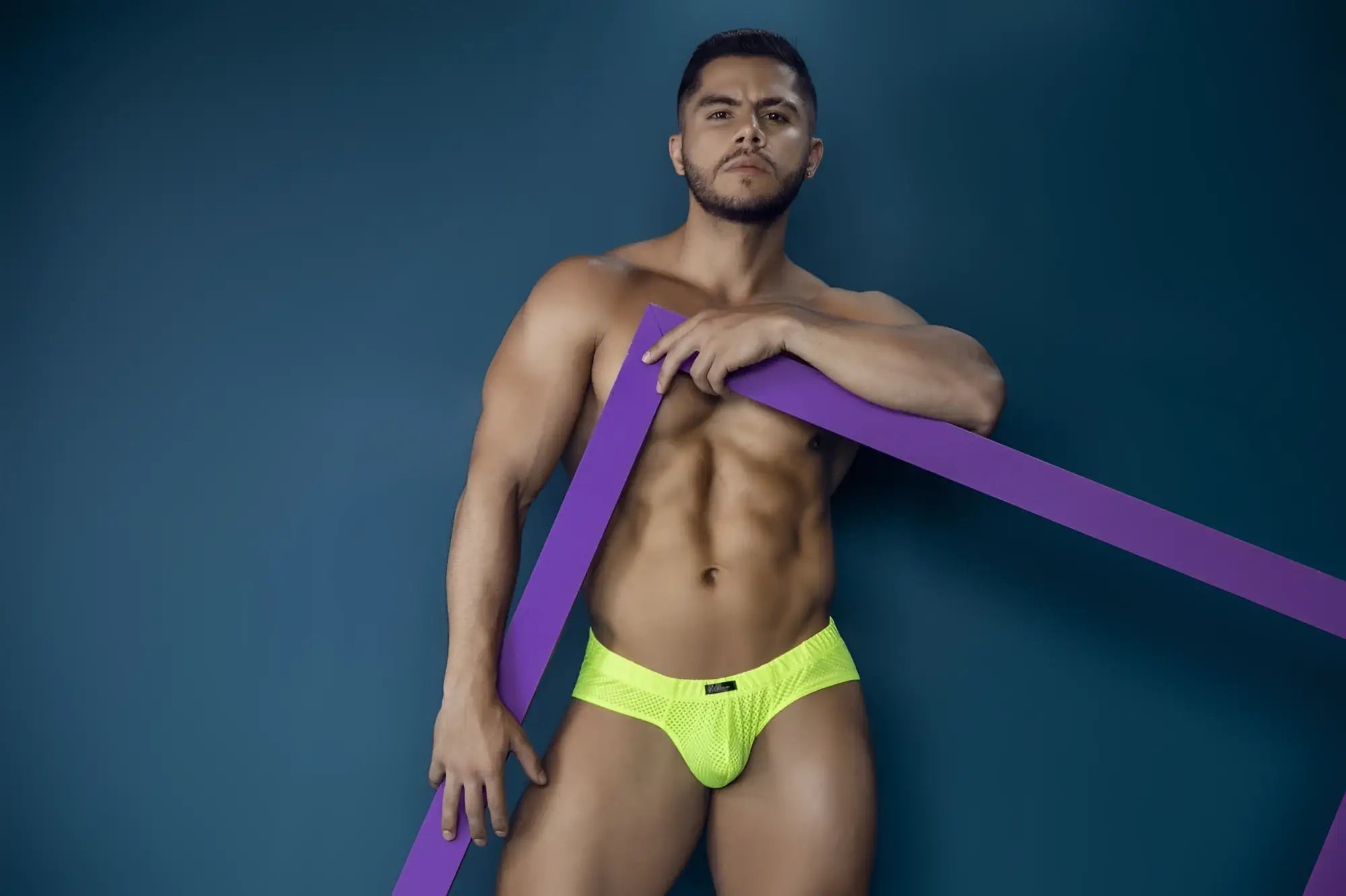 Xtremen 91227 microfiber briefs in bright neon yellow mesh with a subtle black logo on the front