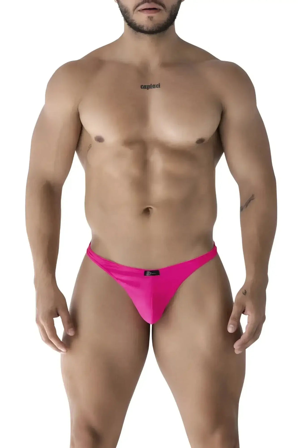 Bright pink form-fitting microfiber thong with smooth fabric and black Xtremen brand tag at the waistband back side