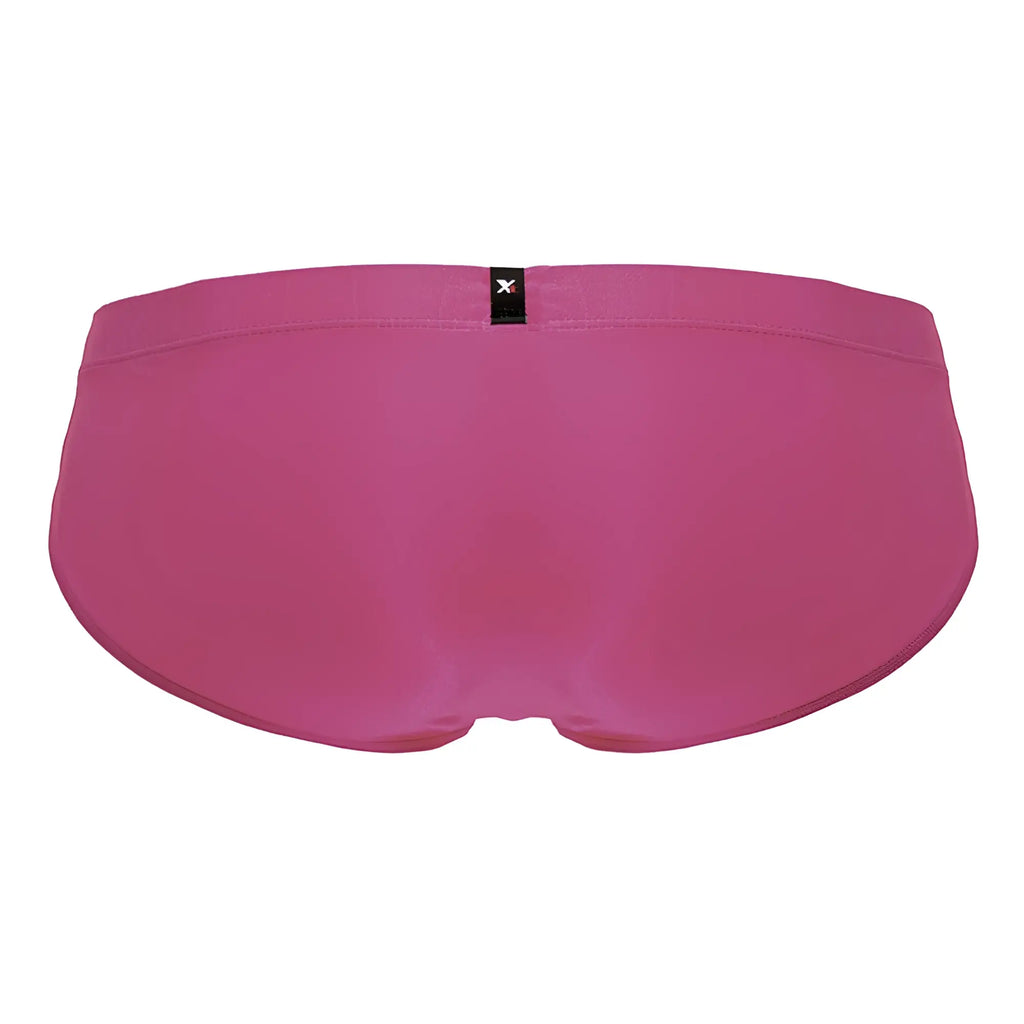 A vibrant fuchsia xtremen 91233 microfiber men’s brief with smooth stretchy fabric and a black brand tag at the waistband