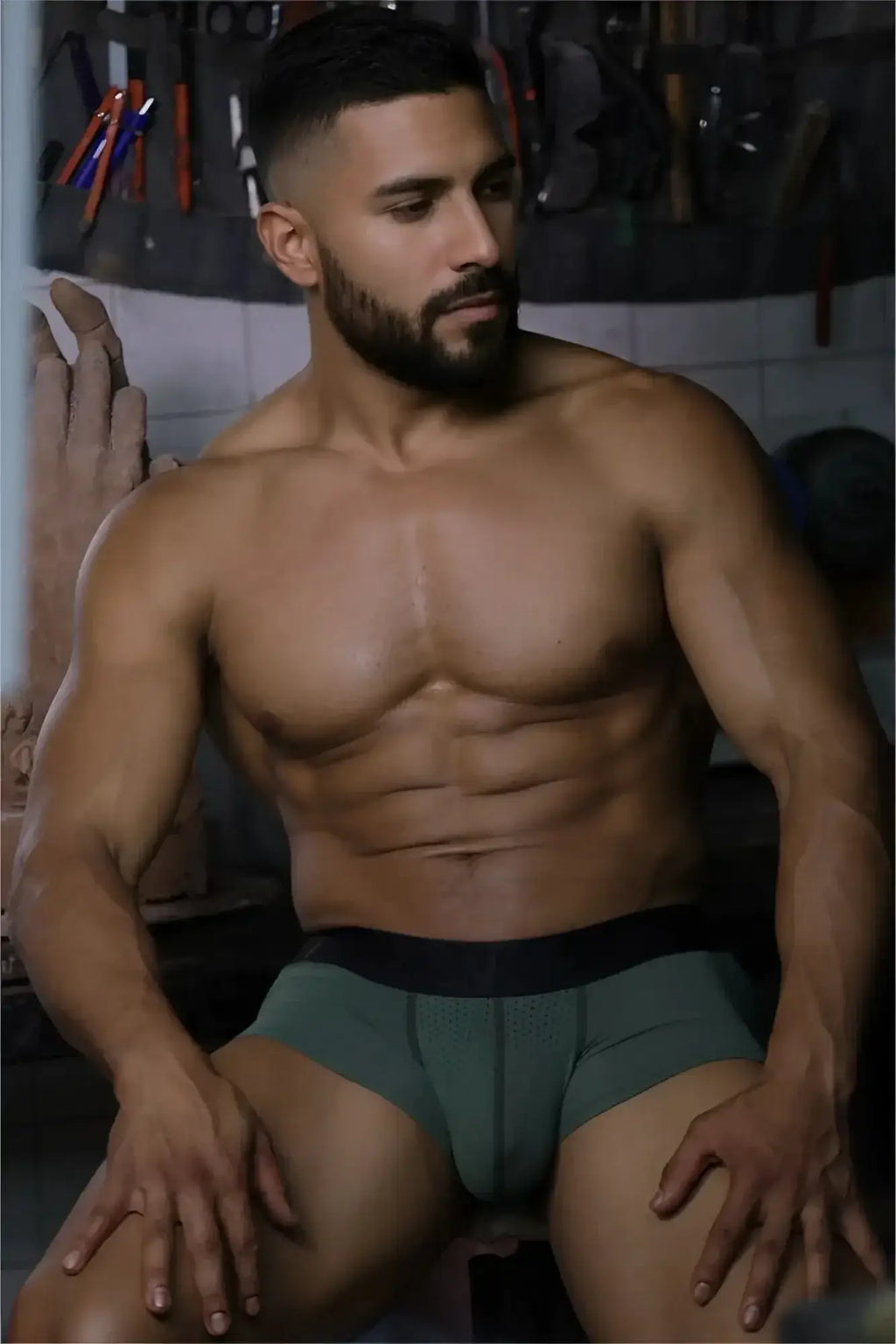 Lifestyle shot of a man wearing Xtremen 91252 Microfiber Mesh Trunks in Military Green.