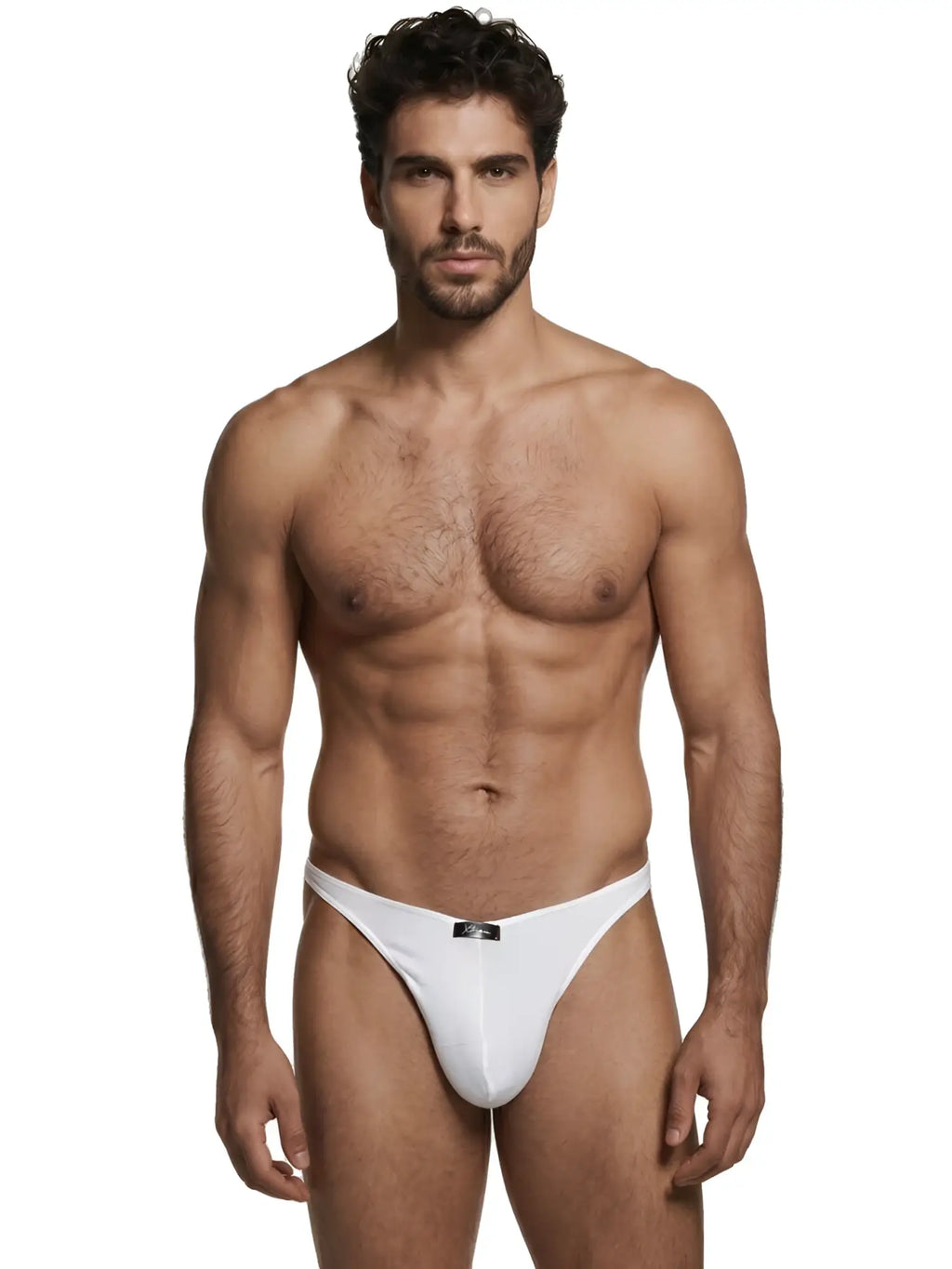 Xtremen white cotton thong, model 92430. Minimalist design with a small branded tag on the front waistband.