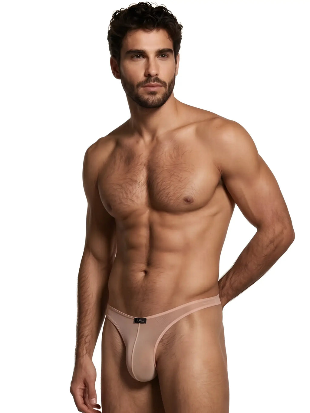 Xtremen beige sheer mesh bikini brief. Model features minimal coverage and thin waistband.