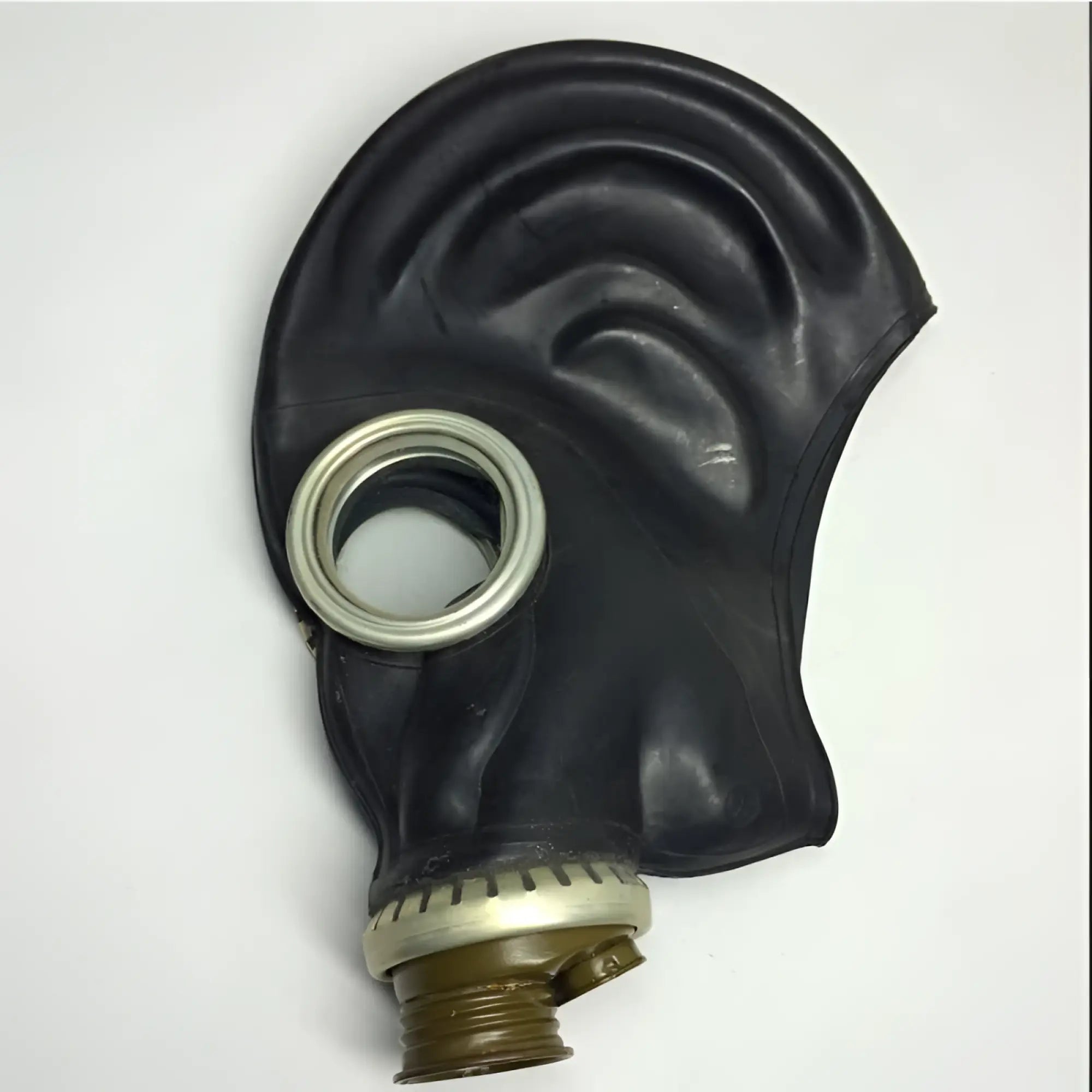 Black rubber XTRM Classic GP5 NATO vintage gas mask with silver metal rim and brass fittings for protective use