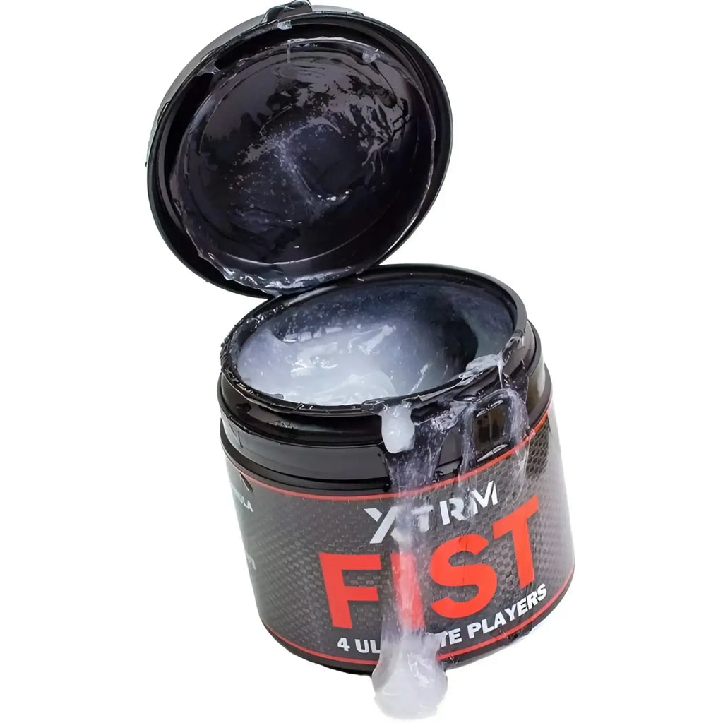 Black cylindrical container of xtrm fist 4 ultimate players lube holding translucent gel for ultimate players use