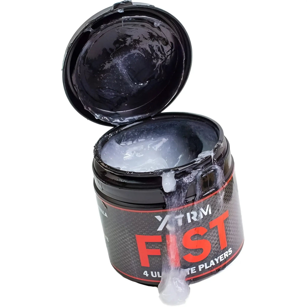 Black cylindrical container of xtrm fist 4 ultimate players lube holding translucent gel for ultimate players use