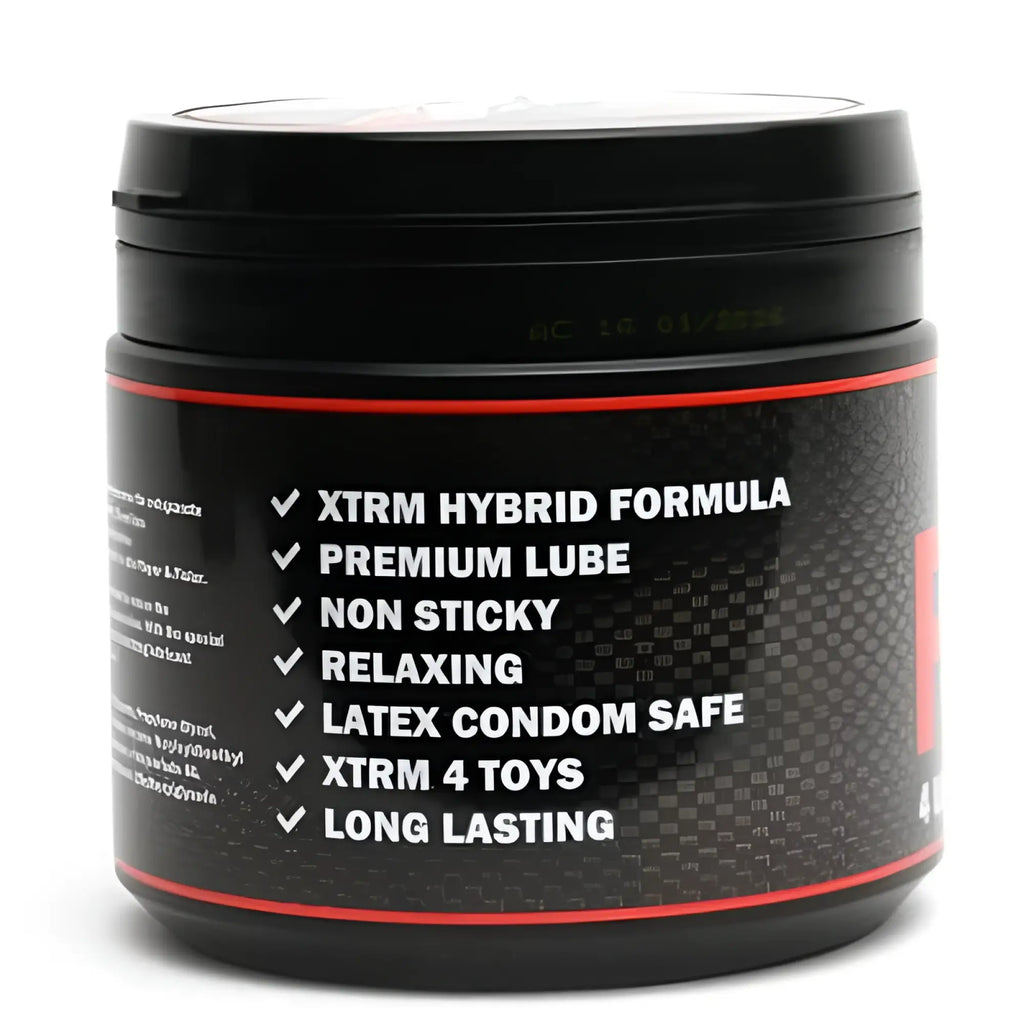 Black cylindrical container with carbon-fiber texture and red trim labeled xtrem hybrid formula premium lube 500ml