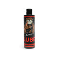 Black plastic bottle with red accents featuring a cartoon bulldog labeled xtrm lube powder 225gm for 25 litres use