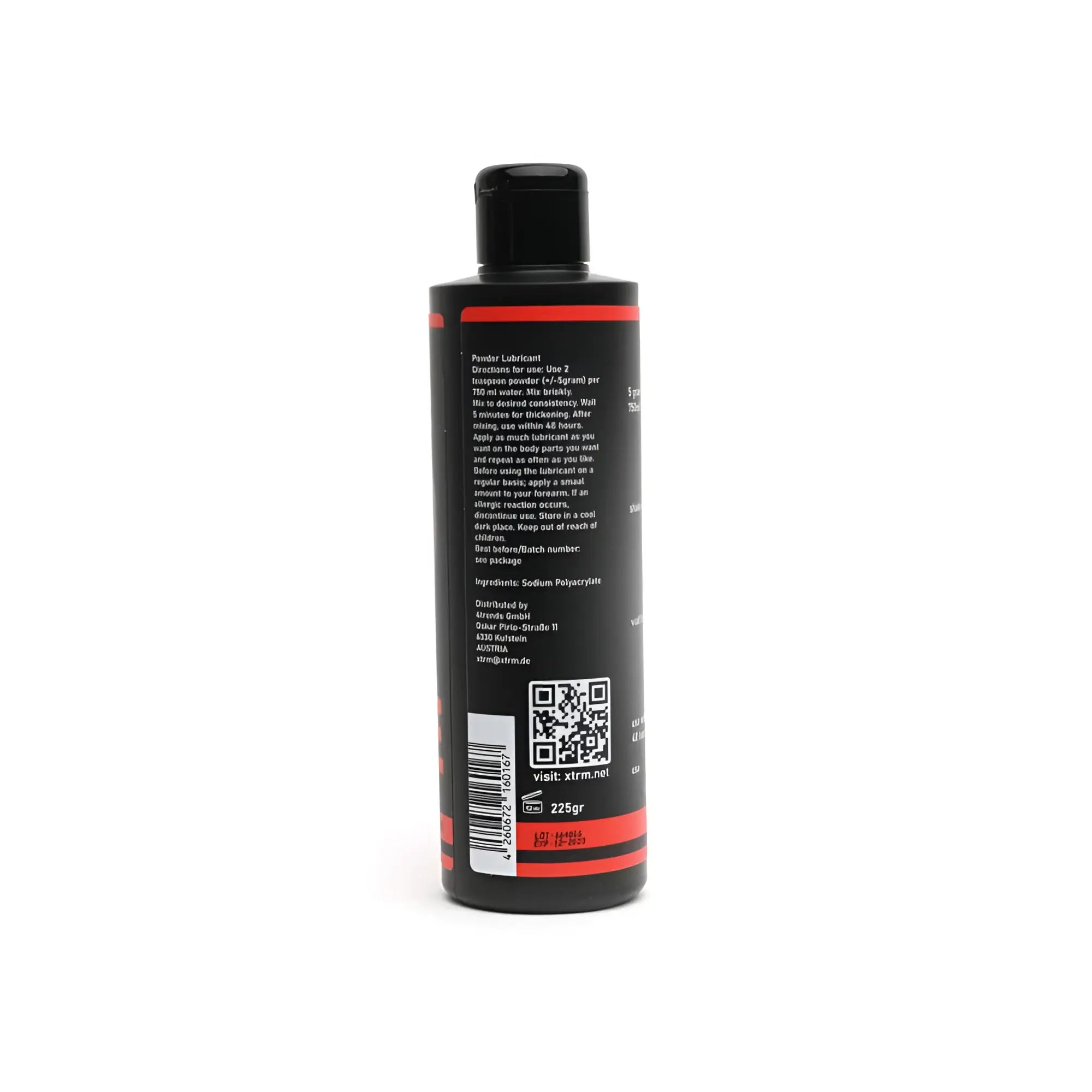 Black plastic bottle with red accents and black cap containing xtrm powder lubricant 225gm for 25 litres use
