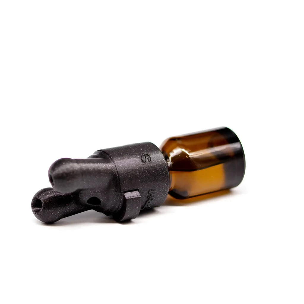Xtrm xtrm snffr double small leakproof vape cartridge with black plastic and amber glass and textured grip