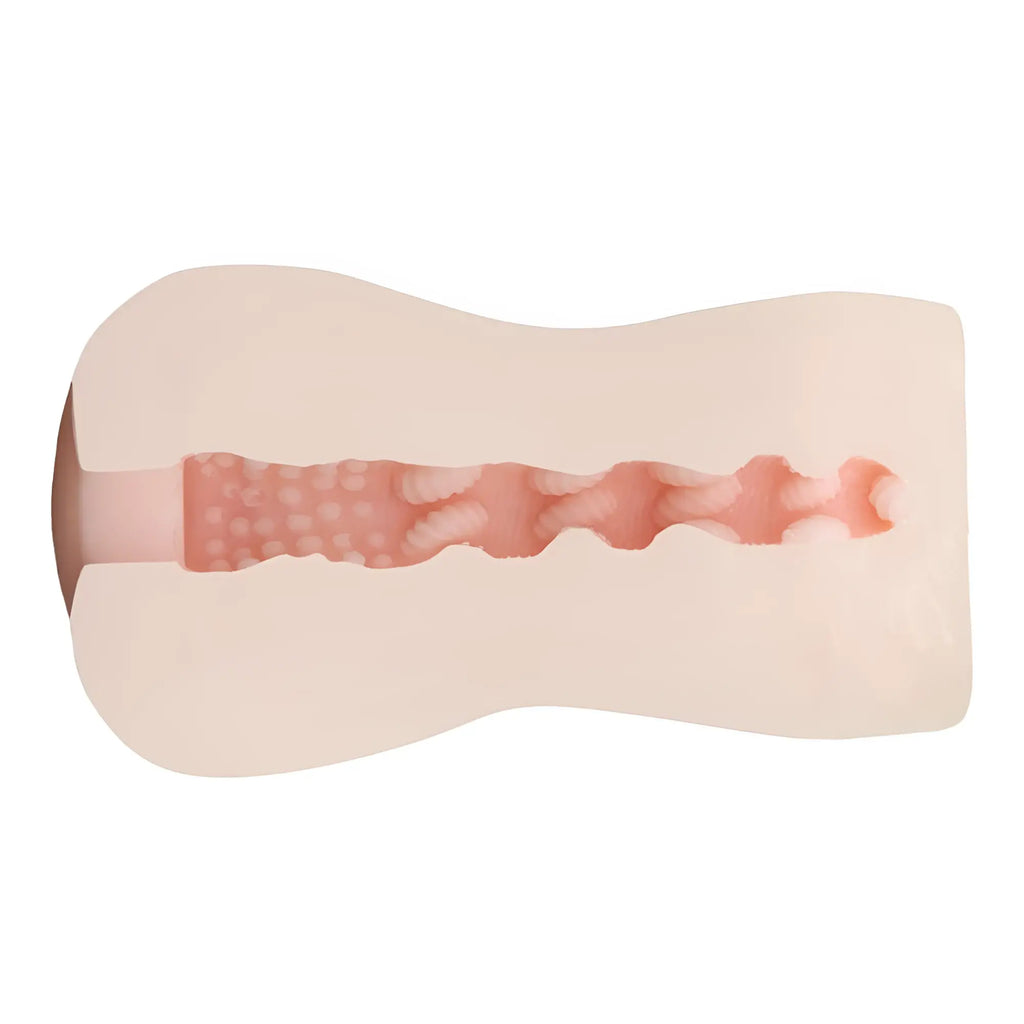 Pink silicone anal plug with textured ridged interior and smooth surface from yuira cool blonde maid masturbator